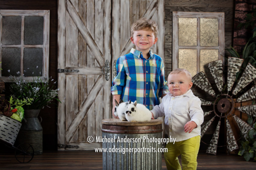 Two cute brothers hang out with our two bunnies, Spotty and Vanilla during their Easter Bunny Photos. Mounds View MN Photographer Easter Bunny Portraits 2018.