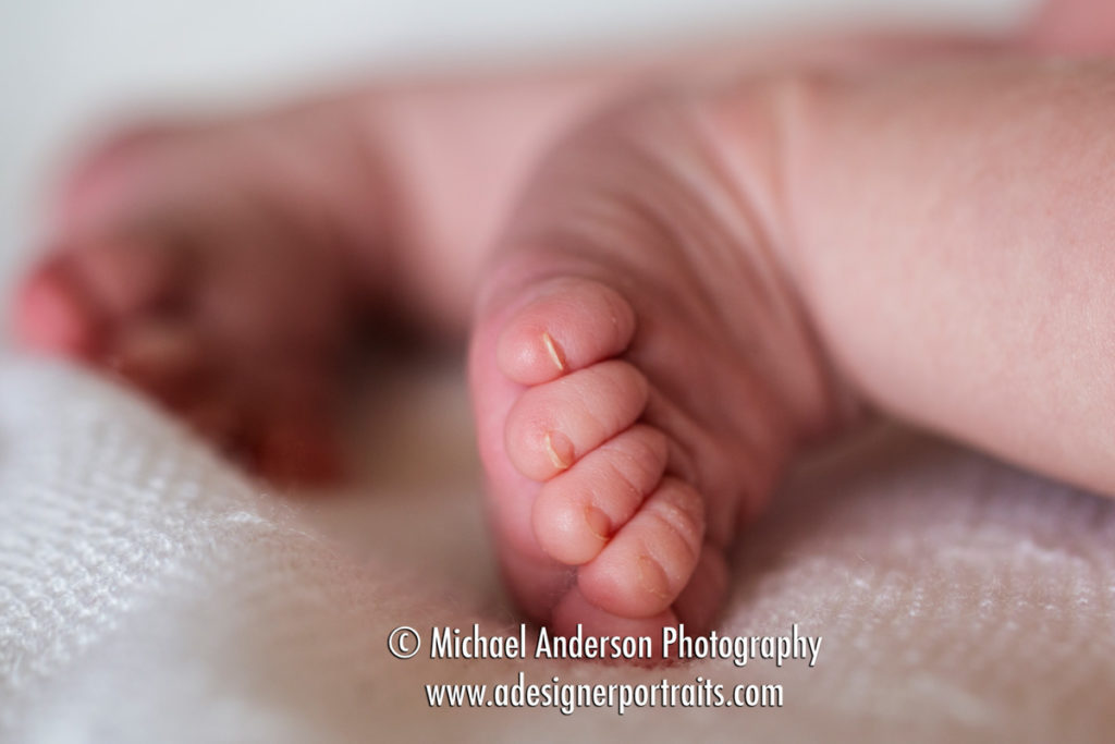 Charlotte's eleven-day-old newborn photos. A close-up photo of her tiny feet.