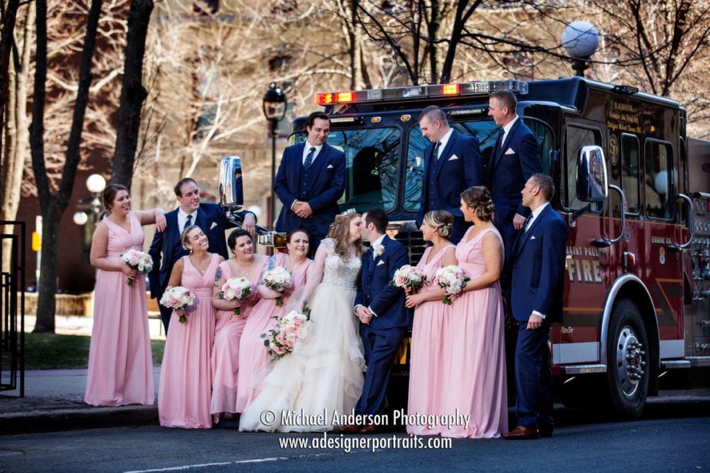 A'BULAE wedding photos of a bride and groom, and their wedding party with Saint Paul Fire Department Engine Company #8.