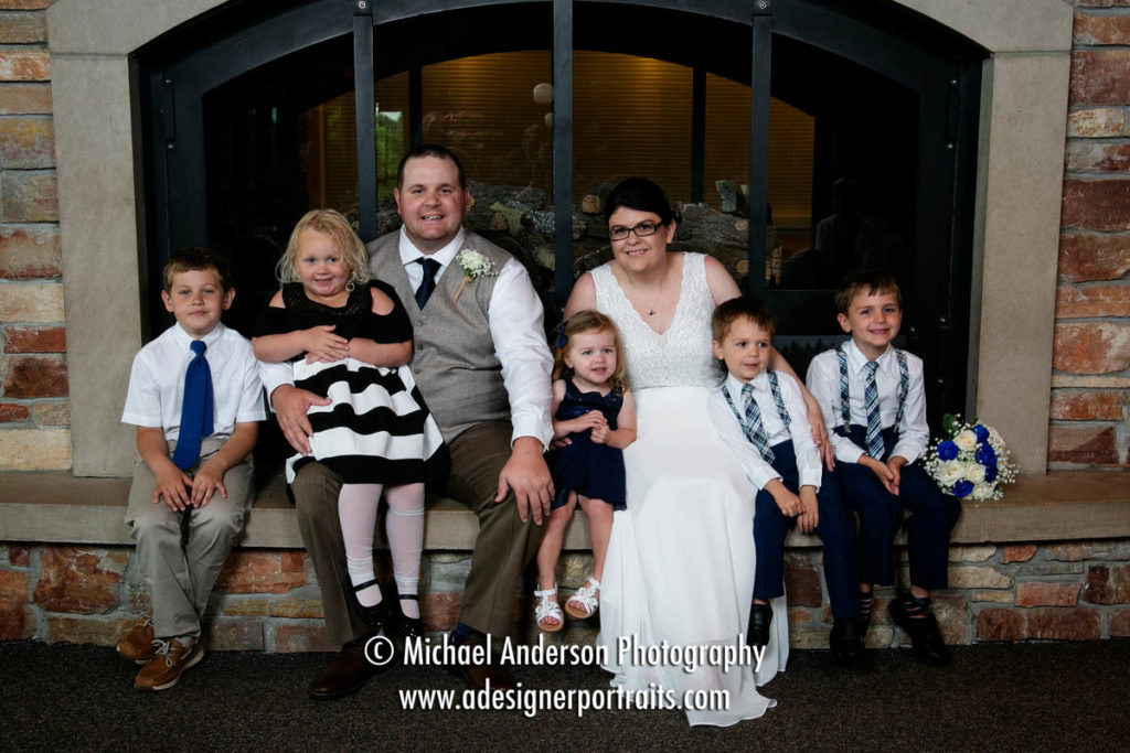 Cute Elm Creek Park Reserve wedding photography of the bride and groom and all of their nieces and nephews.