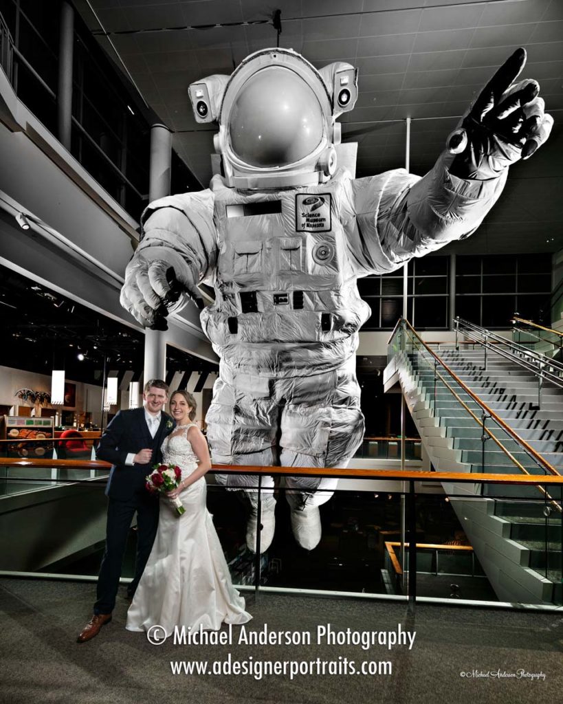 A cool, Science Museum of Minnesota light painting! The bride & groom by the astronaut display.