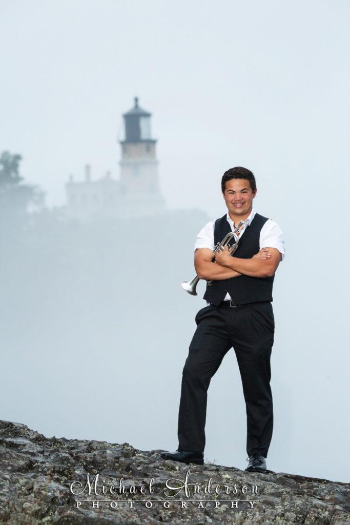 Lake-Superior-senior-photos-boy-with-trumpet-Split-Rock-Lighthouse-State-Park