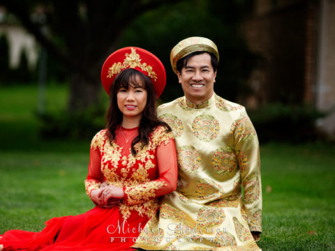 Tea Ceremony photos. A cute portrait of the couple sitting on the front lawn.