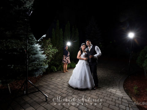 A photo of the bride and groom at the Embassy Suites Minneapolis Airport before creating their light painted wedding photo.