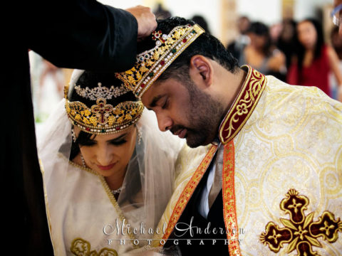 St. Mary's Coptic Orthodox Church wedding photographs of the bride and groom during their wedding ceremony.