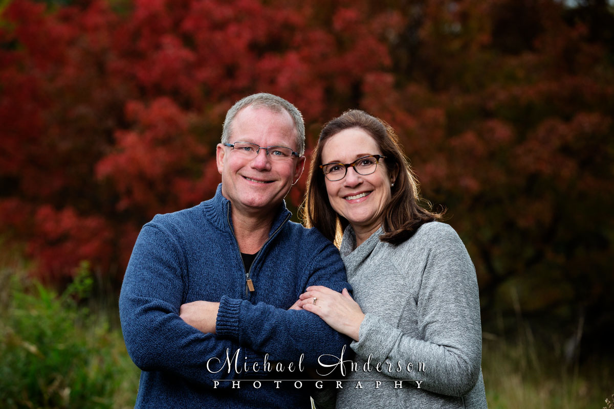 Beautiful fall Rotary Nature Preserve engagement portraits of a cute couple.