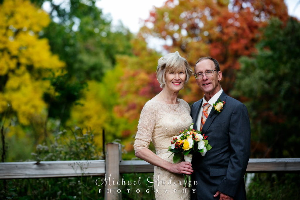 Springbrook Nature Center wedding photos of a cute couple in the fall colors.