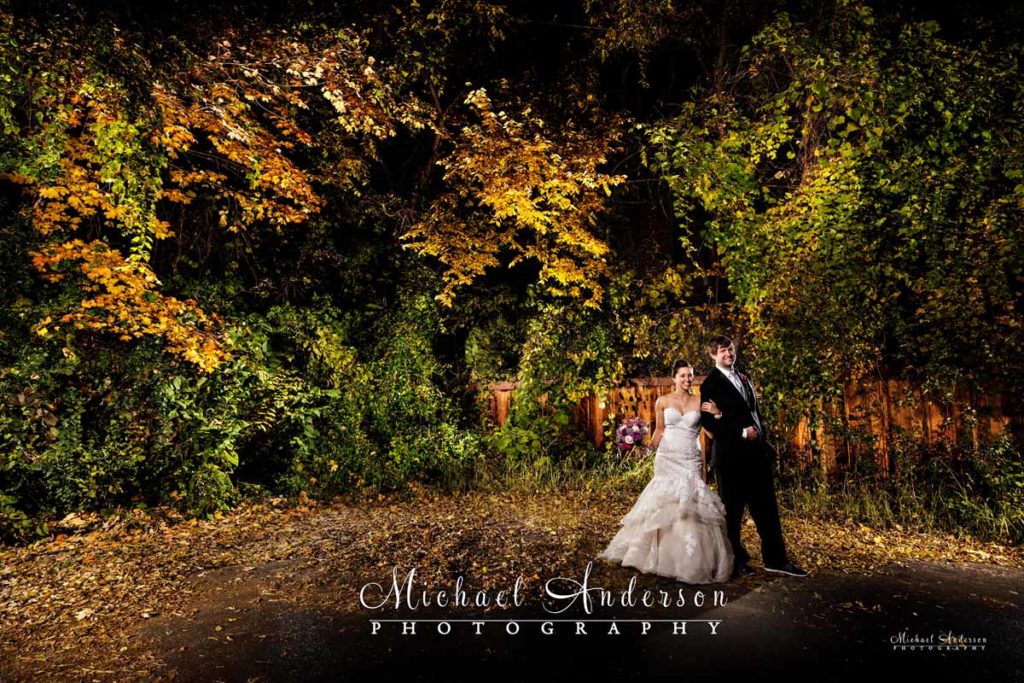 A very pretty fall color light painted wedding photograph created in Stillwater, MN.