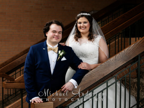 Spirit of Hope United Methodist wedding photo of the bride and groom on the staircase.