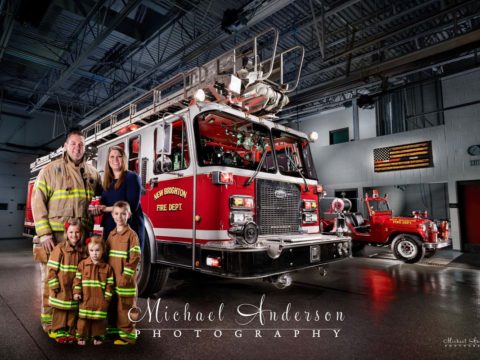 A fire truck family portrait with a light painted photo of New Brighton Engine #498.