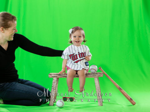 The cutest baseball player ever! A green screen photo of a one-year-old baby girl wearing a Minnesota Twins jersey.