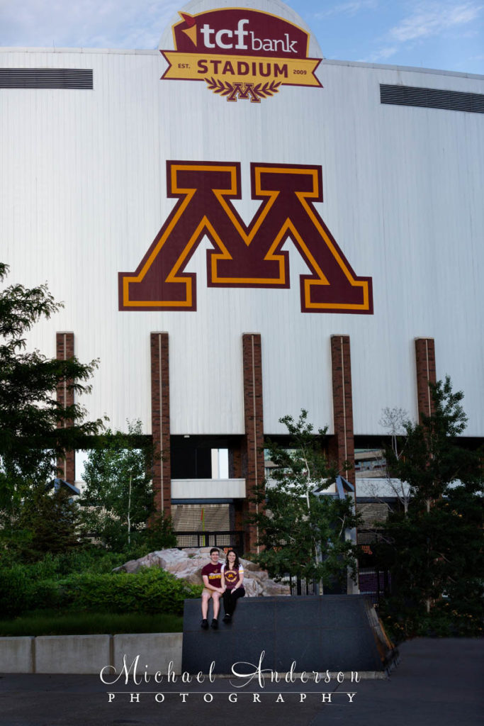 U of M engagement portraits in front of TCF Bank Stadium.