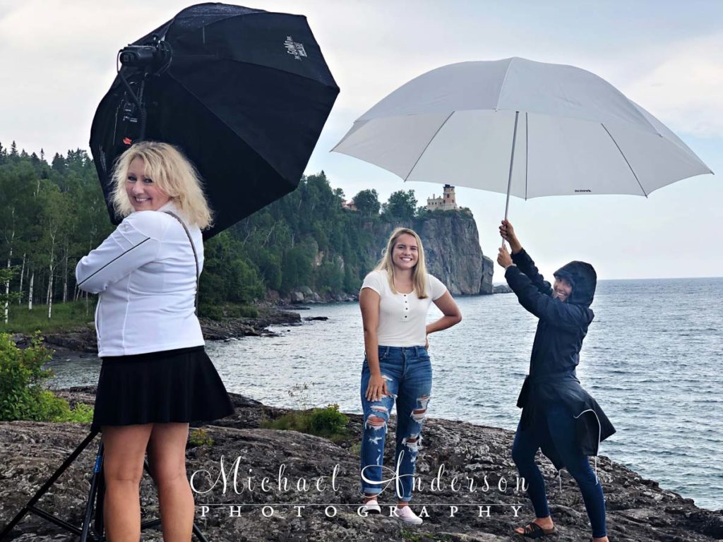Behind-the-scenes Lake Superior senior photographs in the rain.
