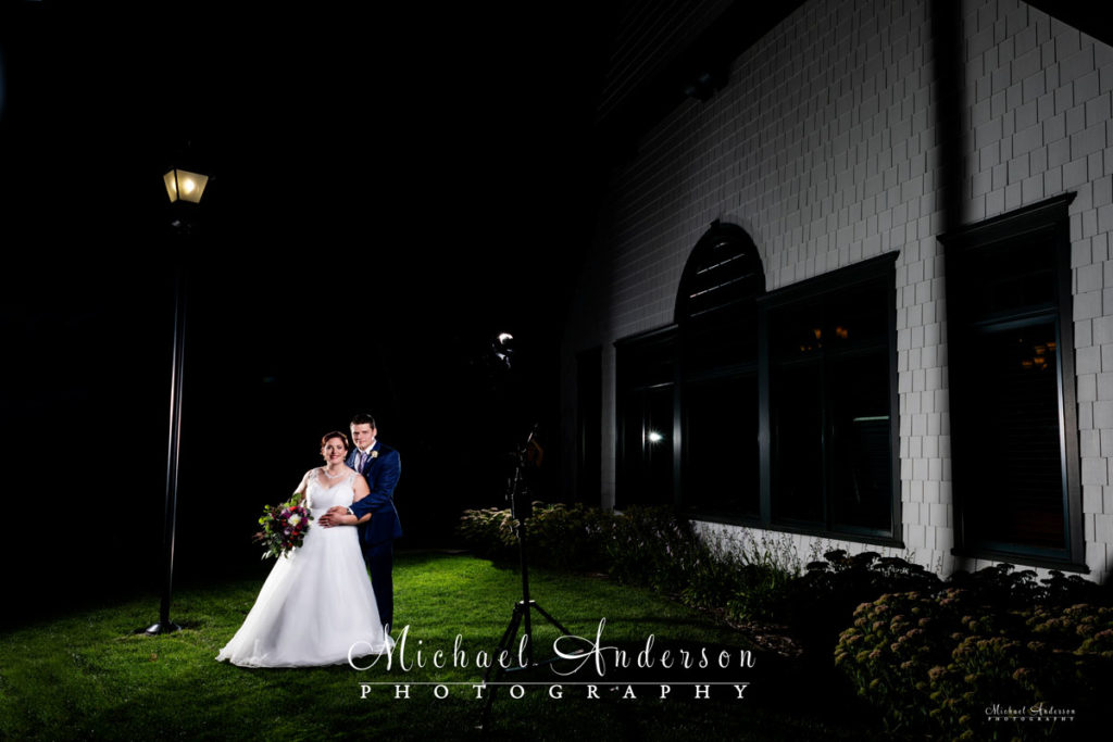 The "set-up" shot for a Keller Golf Course light painting. The bride and groom on the lawn by the clubhouse.