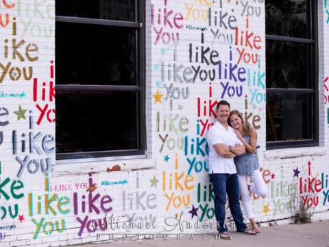 Engagement photo taken at the "I Like You Wall" in Minneapolis, MN.
