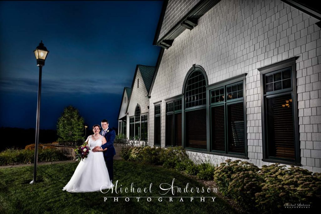A pretty Keller Golf Course light painting of a bride and groom by the clubhouse.