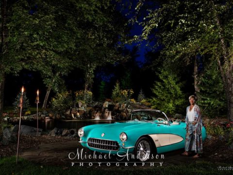 A beautiful light painted photograph of a mint condition 1957 C1 Corvette with it's owner.