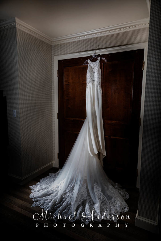 A beautiful light painted photo of the brides stunning wedding dress.