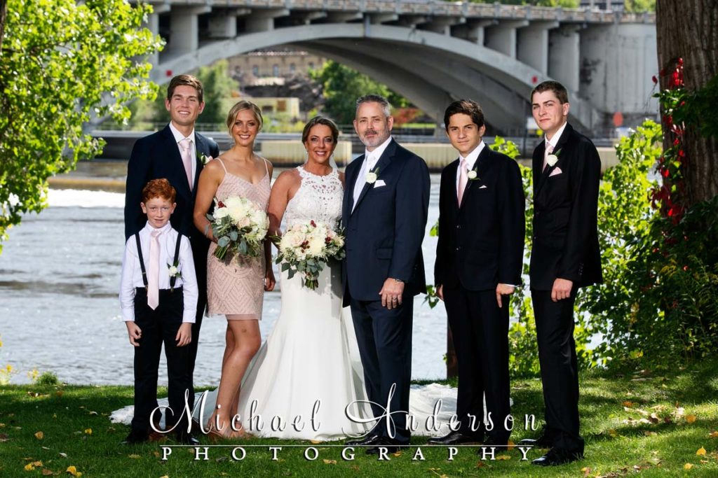 A pretty photo of the wedding party at Nicollet Island.