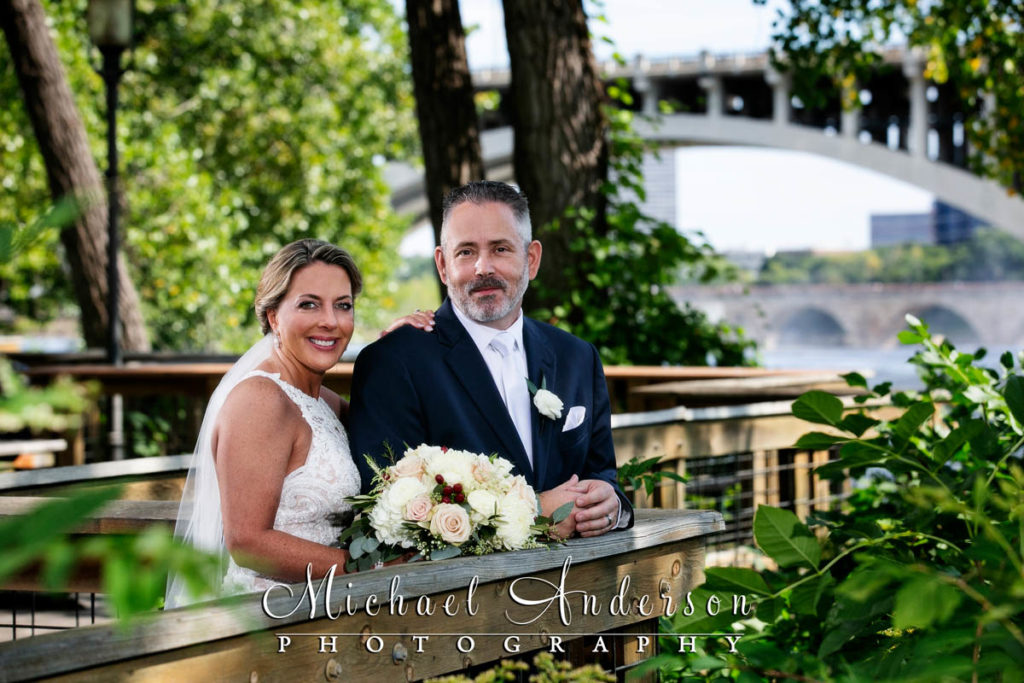 A pretty wedding portrait of the bride and groom at Nicollet Island in Minneapolis, MN.
