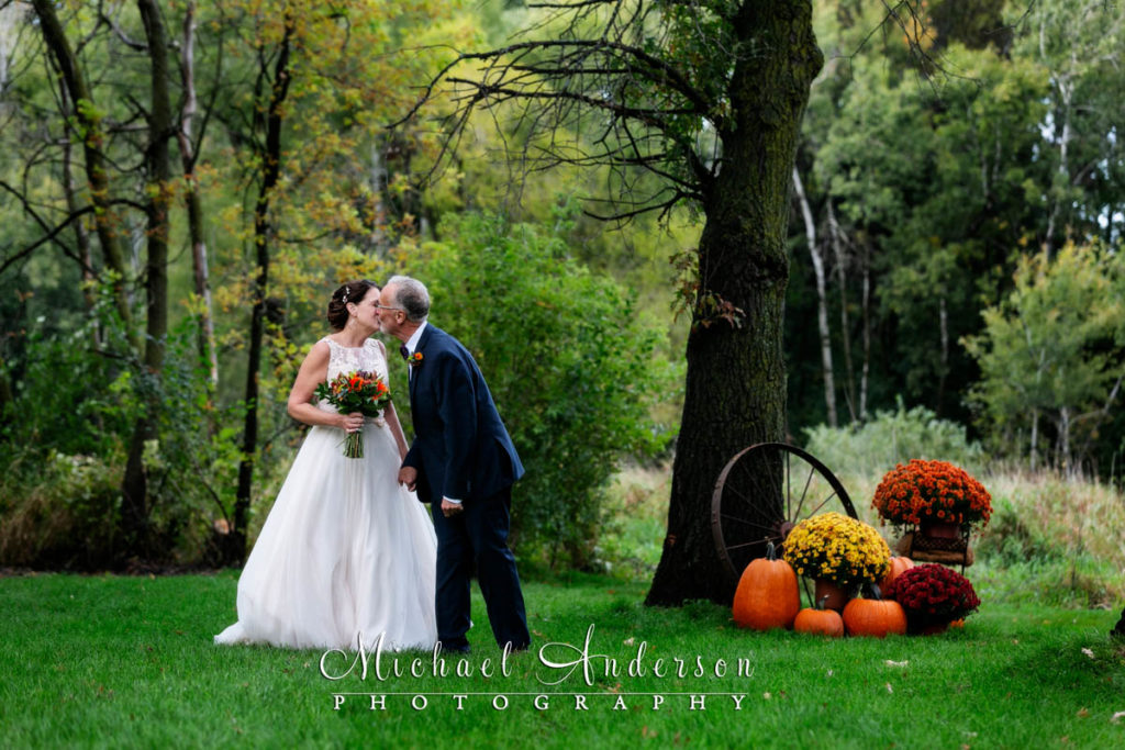 A pretty wedding photo of the bride and groom after their beautiful backyard wedding ceremony in Blaine, MN.
