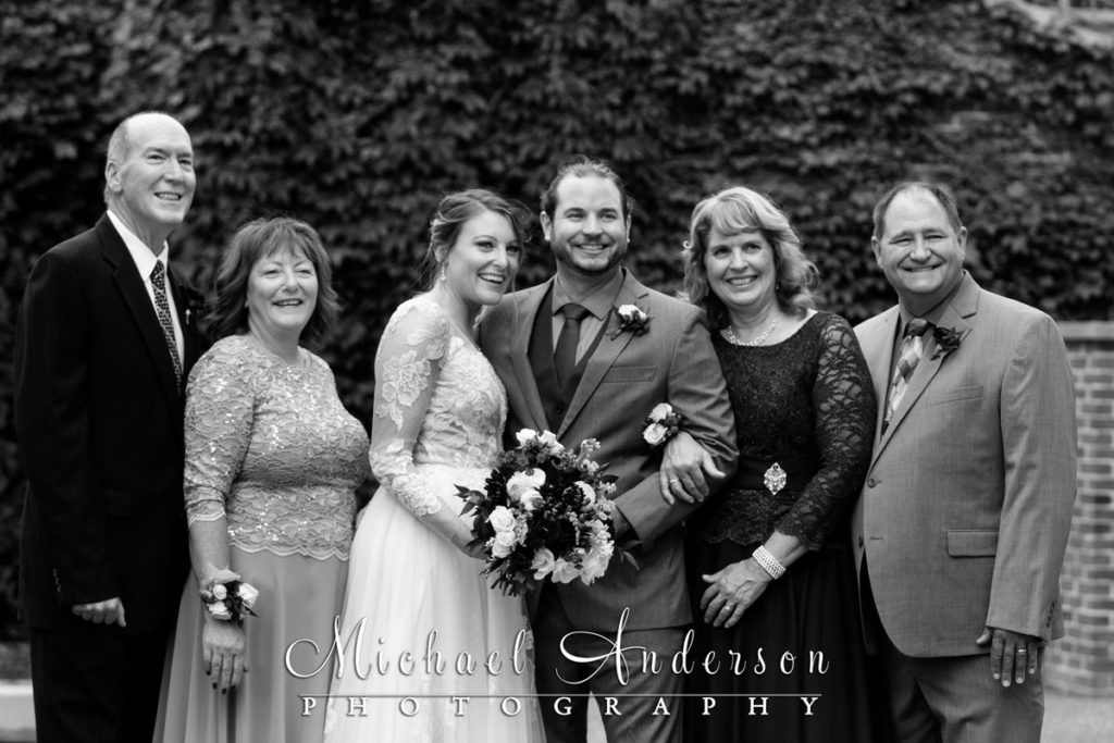 B&W Red Wing wedding photography of the bride & groom with both sets of parents in LaGrange Park.
