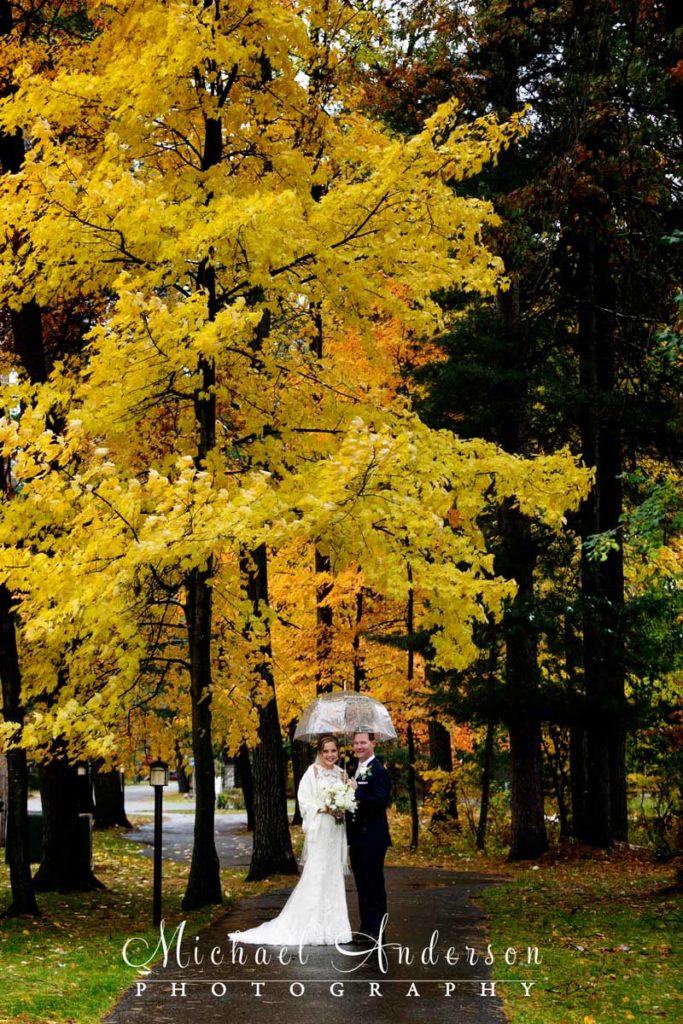 Bride and groom in the pretty fall colors on their Grandview Lodge wedding day.