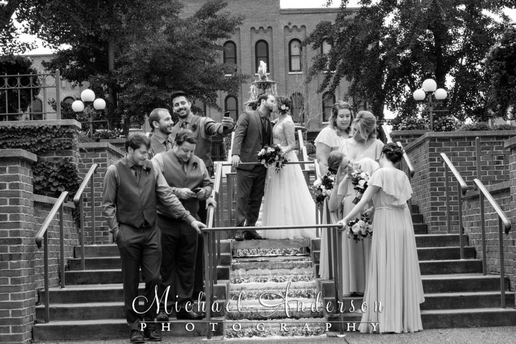 Candid black and white Red Wing wedding photography of the bride, groom, and their wedding party in LaGrange Park.