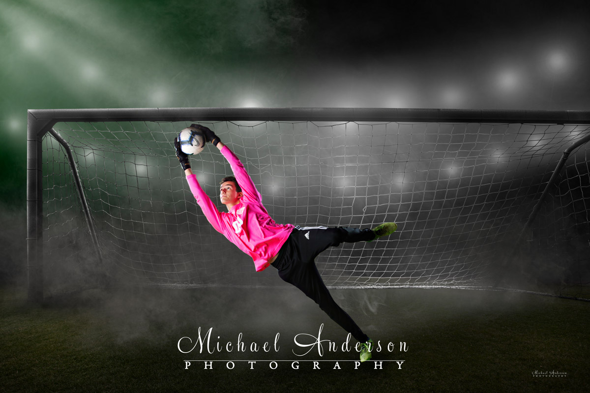 One of Fisher's Hill Murray High School senior portraits. A soccer green screen composite of the save being made.