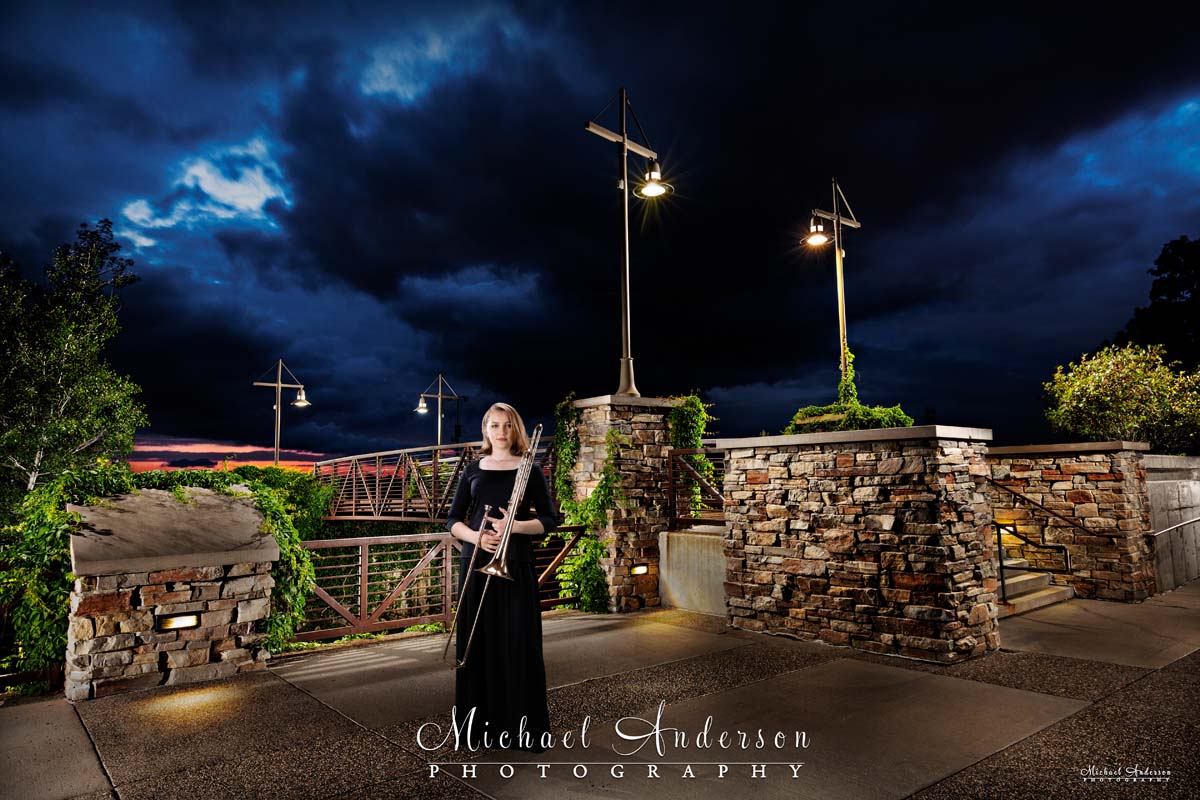 Stunning light painted senior portrait composite created at Elm Creek Chalet at sunset and in-studio on green screen.