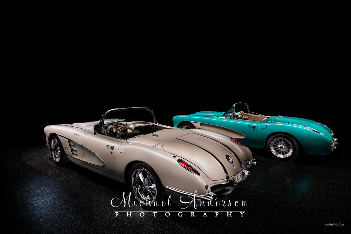 A stunning light painting a pair of Corvettes in total darkness.