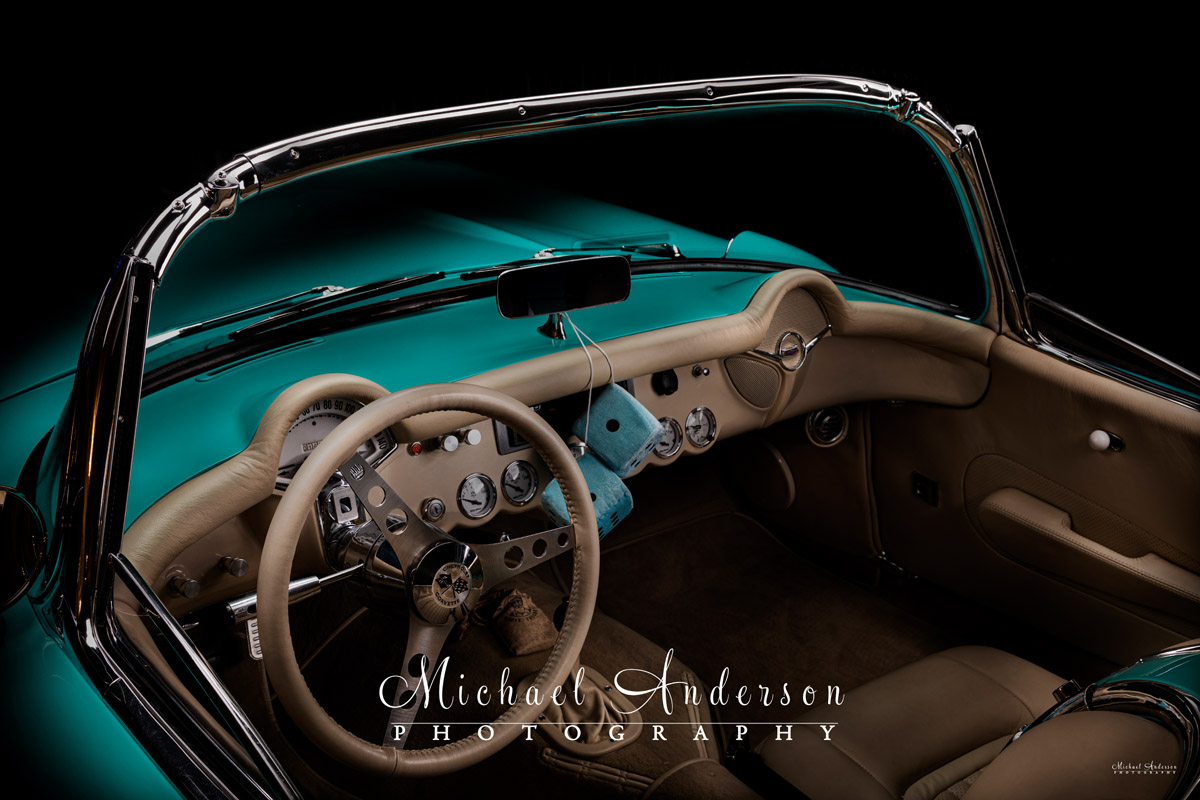 The finished light painting of a 1957 C1 Corvette's interior.