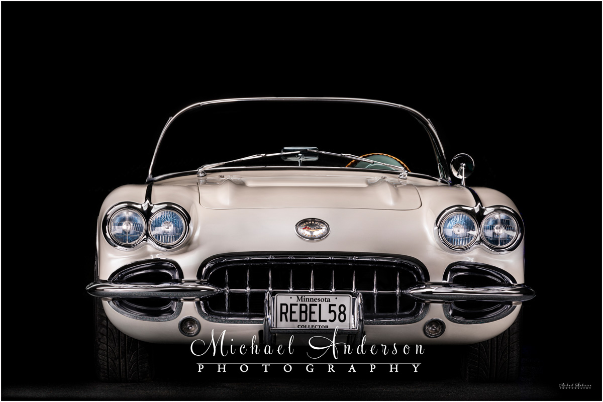 A light painting a 1958 C1 Corvette in total darkness.