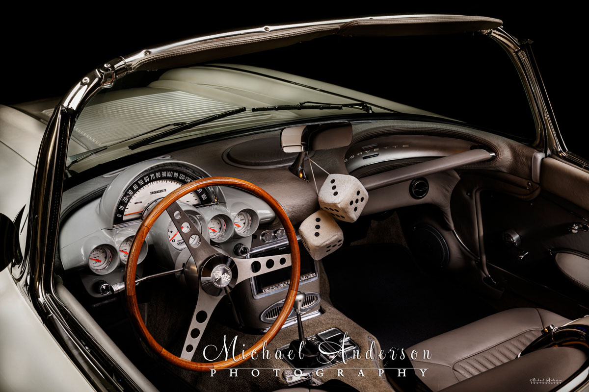 The finished light painting of a 1958 C1 Corvette's interior.