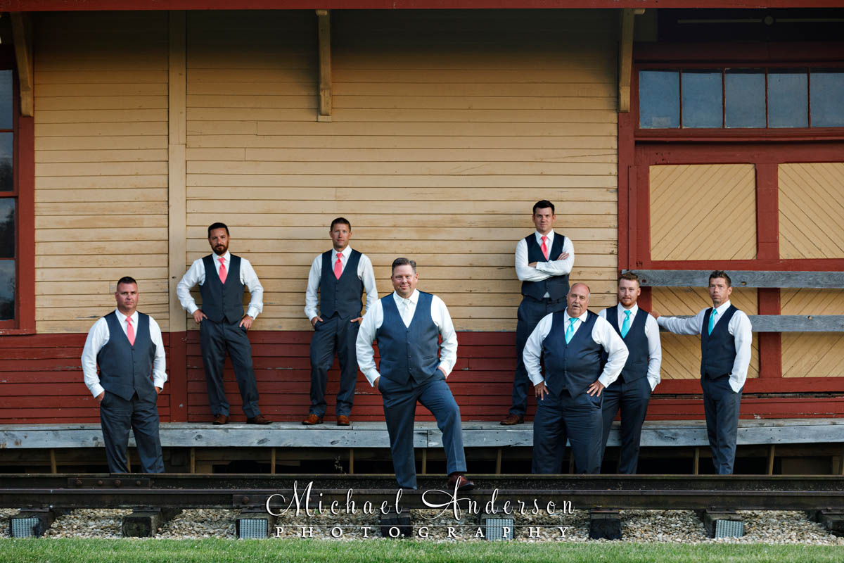 The groom and his groomsmen at the Federal Dam Depot at Little Log House Pioneer Village.