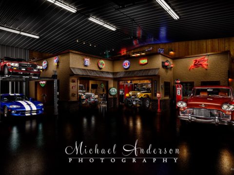 A stunning light painted photograph of a vintage garage inside of a Garage Condo! A total of five vehicles are in the light painting too! Included in the photo are a 1989 Mercedes 450SL, a 1996 Dodge Viper GTS Coupe, a 2003 Jeep Rubicon, a 1980 Jeep CJ-5 Rotisserie, and a cool 1966 Checker Marathon Wagon.
