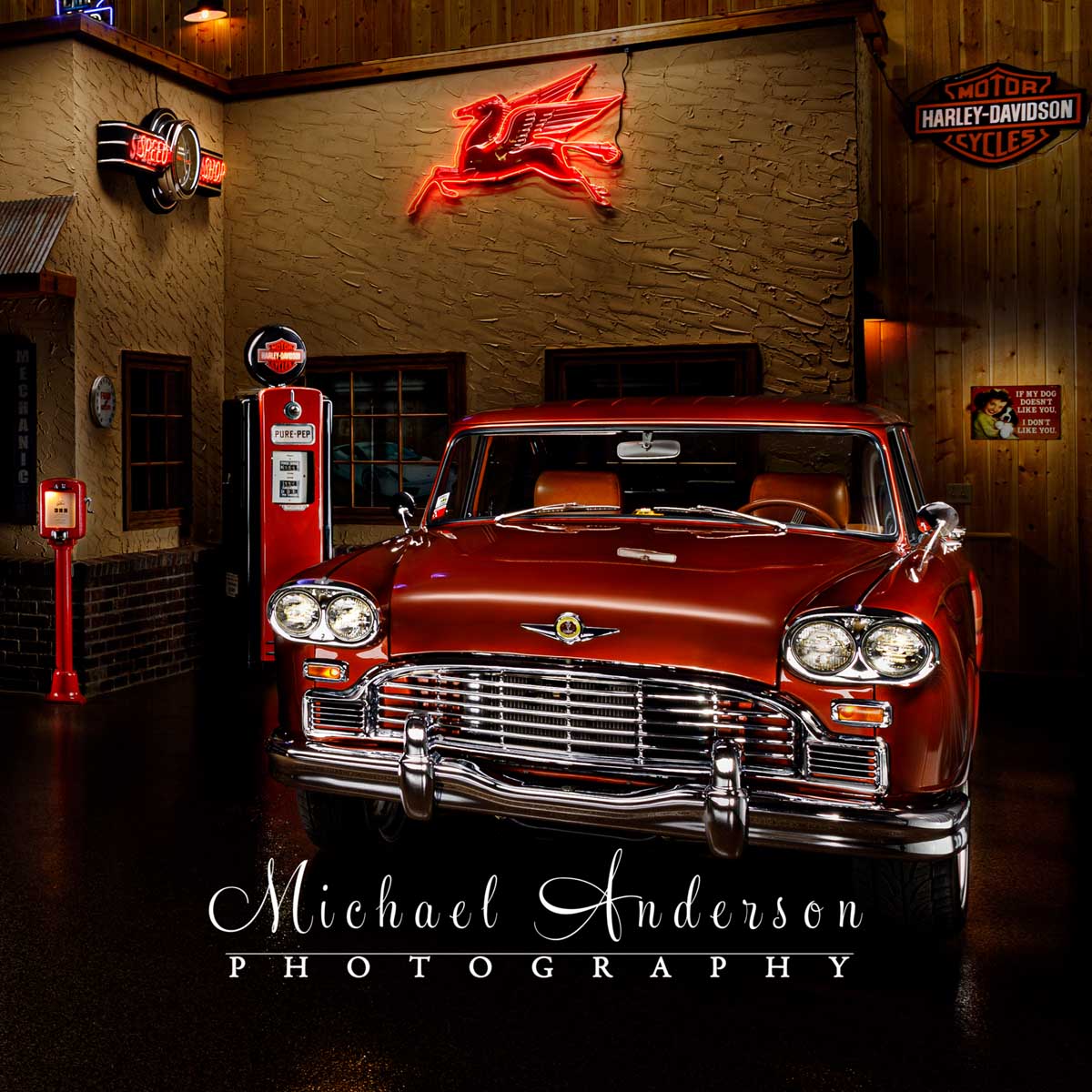 A light painted photograph of a 1966 Checker Marathon Wagon in a Man Cave.