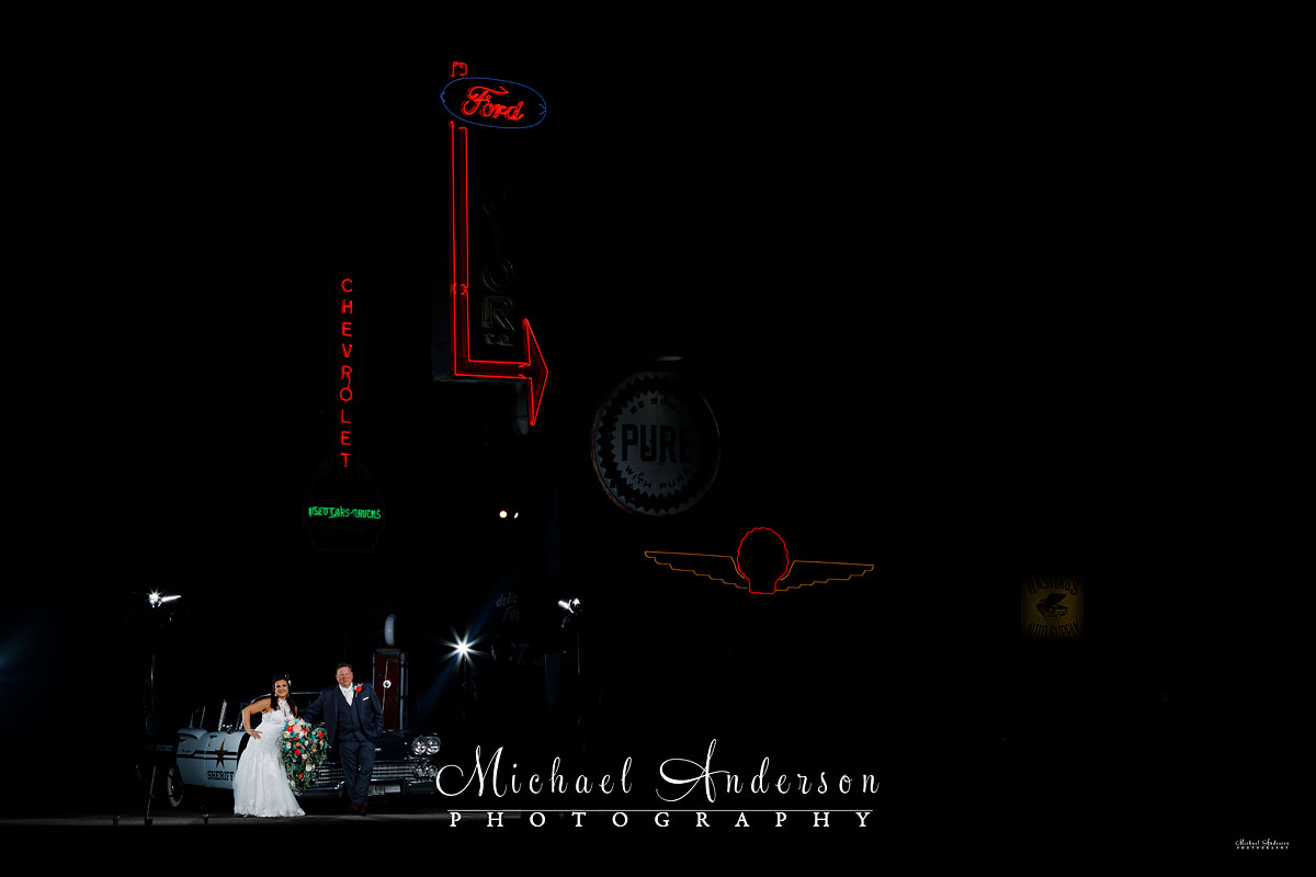 The bride and groom, prior to light painting everything. The location was the vintage gas station at Little Log House Pioneer Village in Hastings, MN.