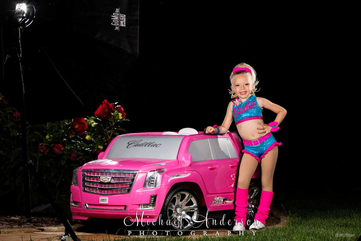 The set-up shot, with a Barbie Girl, prior to light painting a pink Cadillac Escalade.