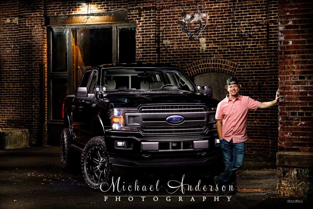 A cool senior portrait light painting with his Ford F-150 pickup truck.