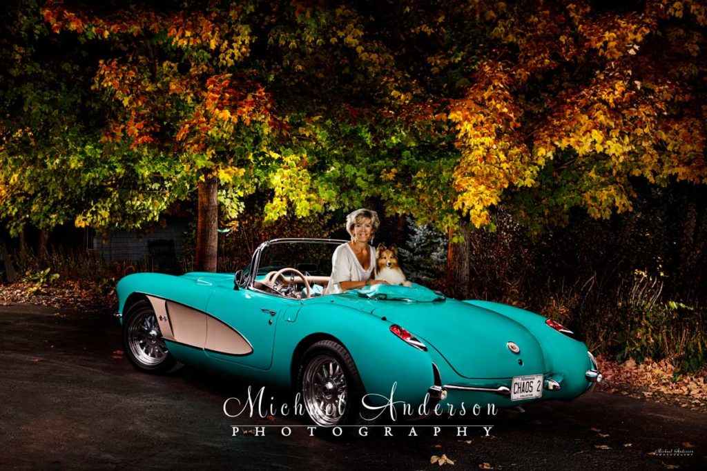 A beautiful pet and pet owner portrait combined with a light painted photo of a 1957 C1 Corvette.