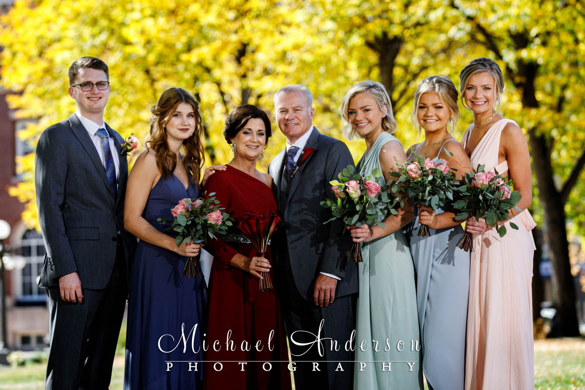 A pretty wedding photo taken in the fall colors in Rice Park in St. Paul, MN.