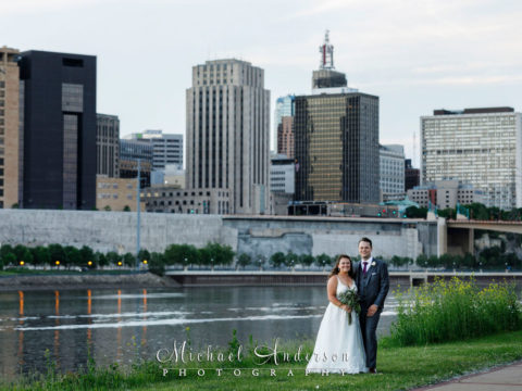 Pretty wedding photograph of the bride and groom at sunset on Harriet Island.