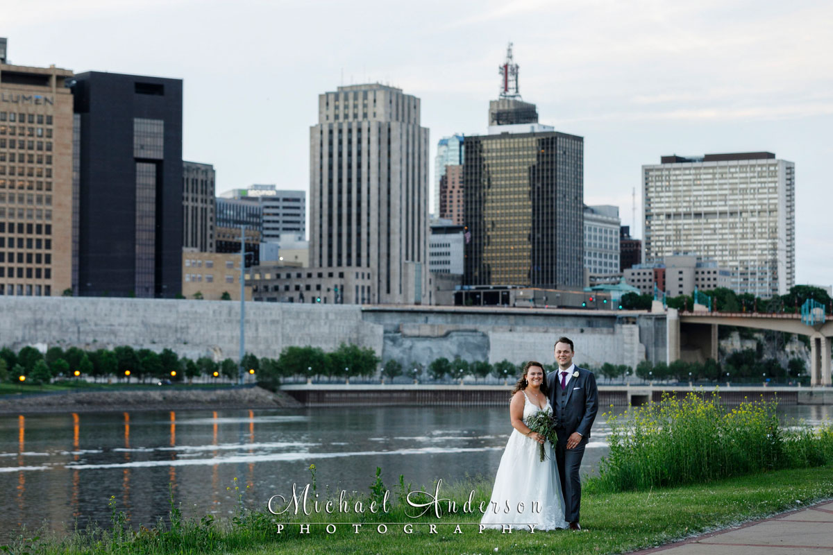 Pretty wedding photograph of the bride and groom at sunset on Harriet Island.