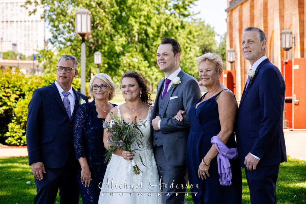 Bride and groom with both sets of parents. Photograph was taken before their Harriet Island wedding.