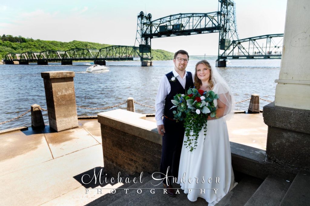 Bride and groom in a gazebo on the St. Croix River in downtown Stillwater, MN.