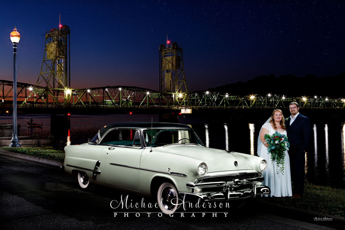 Light painted wedding photograph of the bride and groom with a 1953 Ford Crestline Victoria in Stillwater, MN.