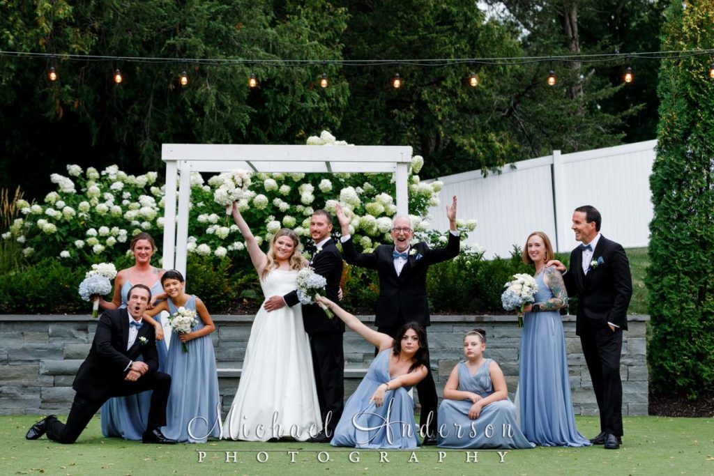 A fun wedding party photo taken at The Hutton House in Medicine Lake, MN.