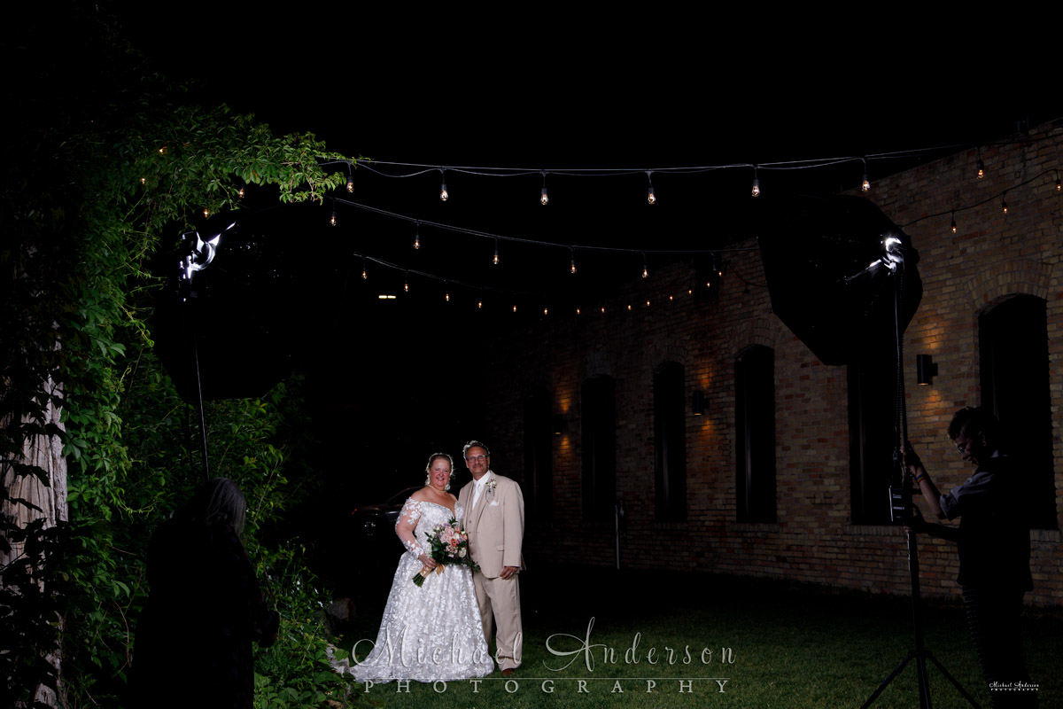 Nighttime photo of the bride and groom to be added to their light painted wedding photograph.