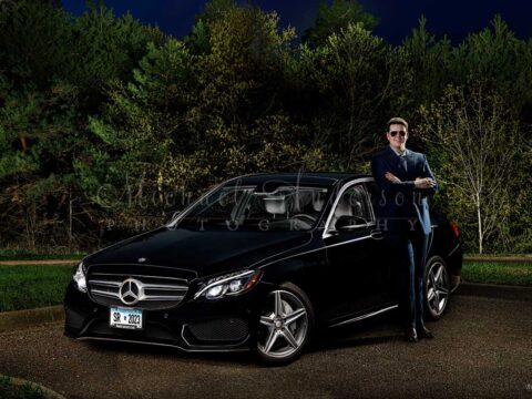 A cool light painted photo of a high school senior and a 2016 Mercedes Benz C300 in a park in Coon Rapids, MN.
